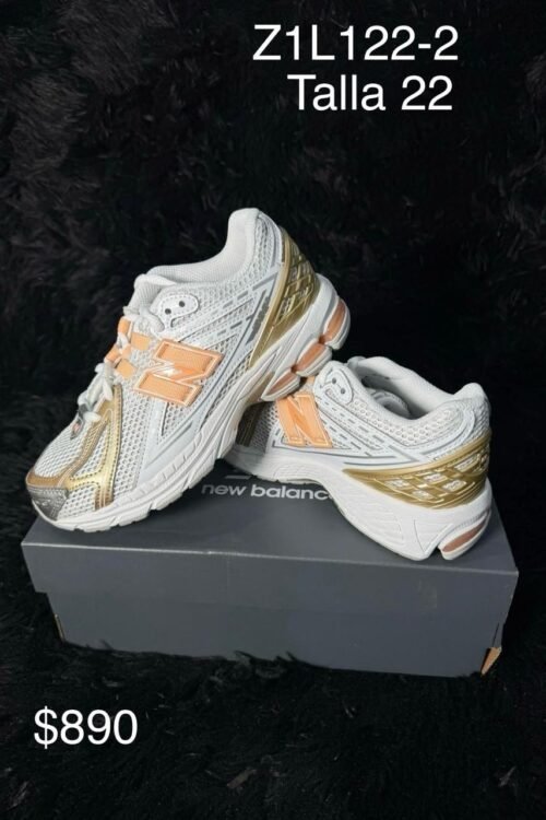 Tenis New Balance 1906R blanco con dorado talla 22 MX en su caja