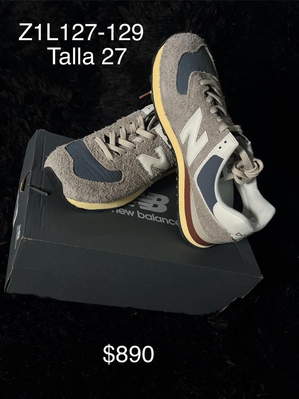 Tenis New Balance 574 gris con azul marino talla 27 MX en su caja